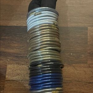 Stacked Multi-Color Women’s Coil Bracelets – White, Gold, Black, Blue